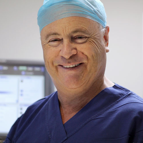 Dr Welch in surgical scrubs and cap