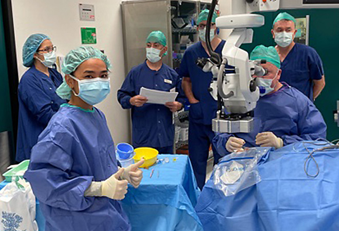 surgical team in operating room, one giving a thumbs up sign | Vision Hospital Group