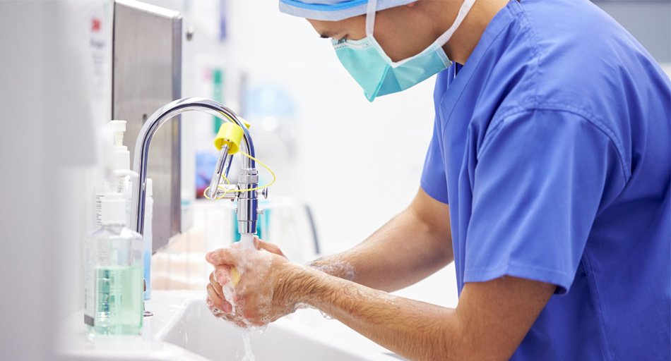 surgeon washing their hands | Vision Hospital Group
