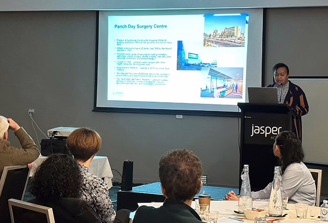 A picture of a clinician presenting at AONA in Melbourne.